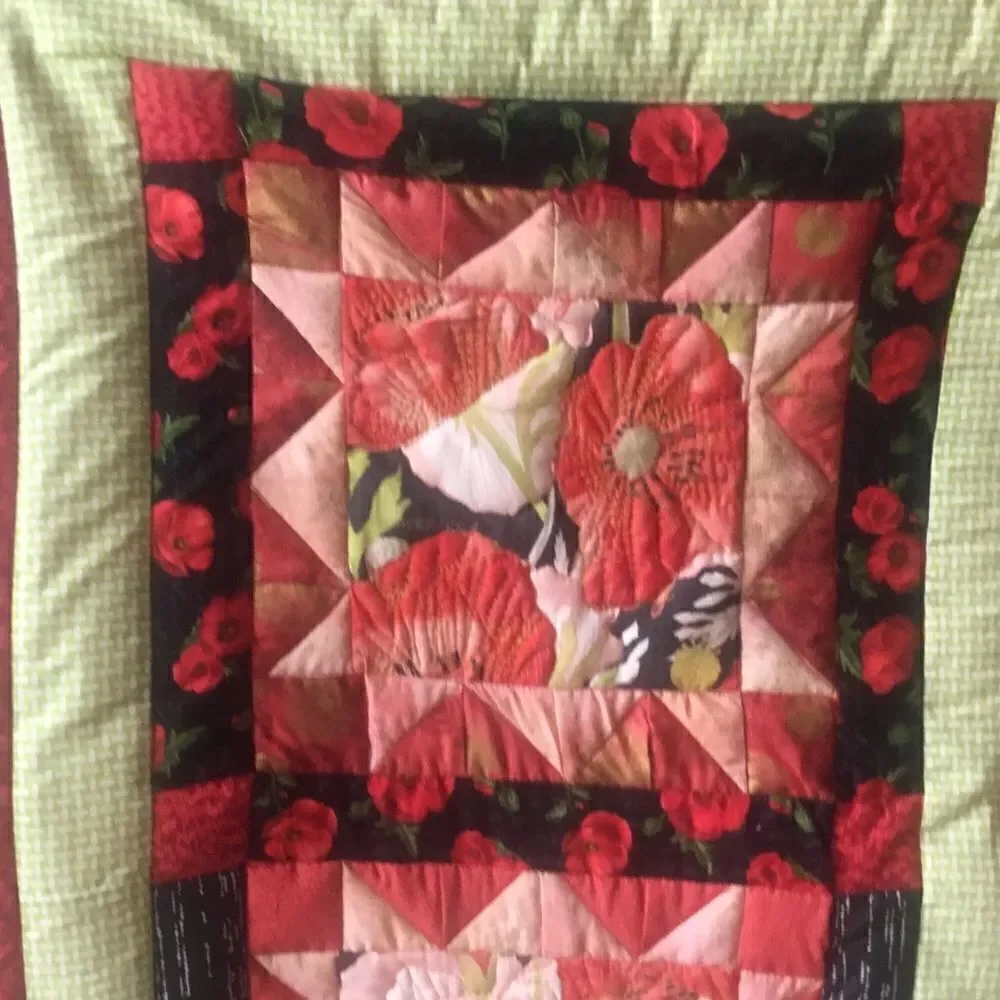 Brand new Hand Crafted Poppies Quilt